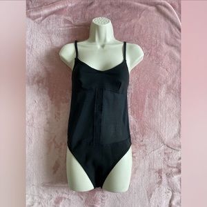 Rowley black stretch bodysuit. Size L. New